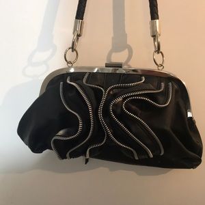 Black flower zipper clutch.